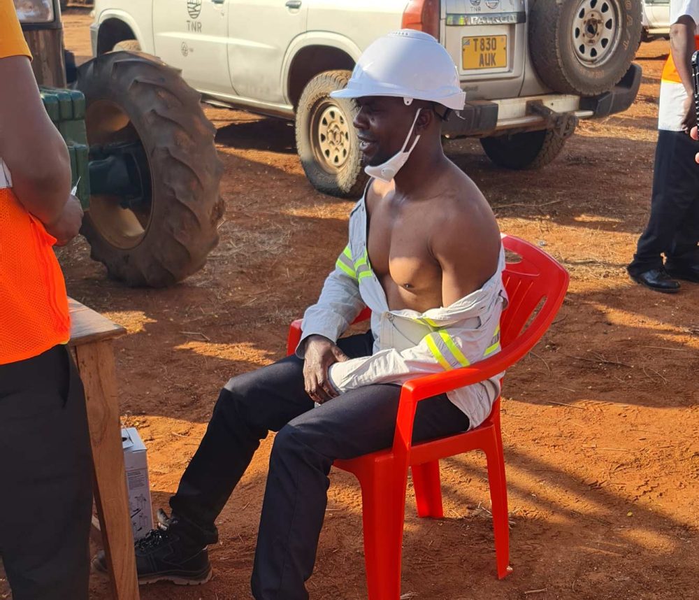 An image of a worker getting a covid vaccination